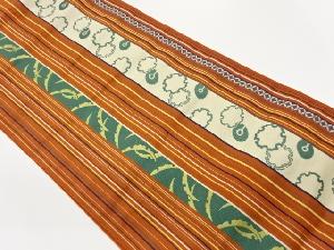 綴れ縞に雪輪・雪芝・七宝模様織出し名古屋帯